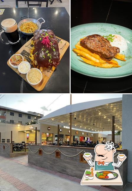 Confira a foto apresentando comida e interior no Turi Steak House