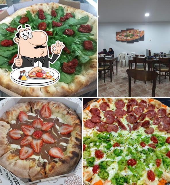 No Scarolli Pizzaria - Rodízio com suco e refrigerante Grátis., você pode provar pizza