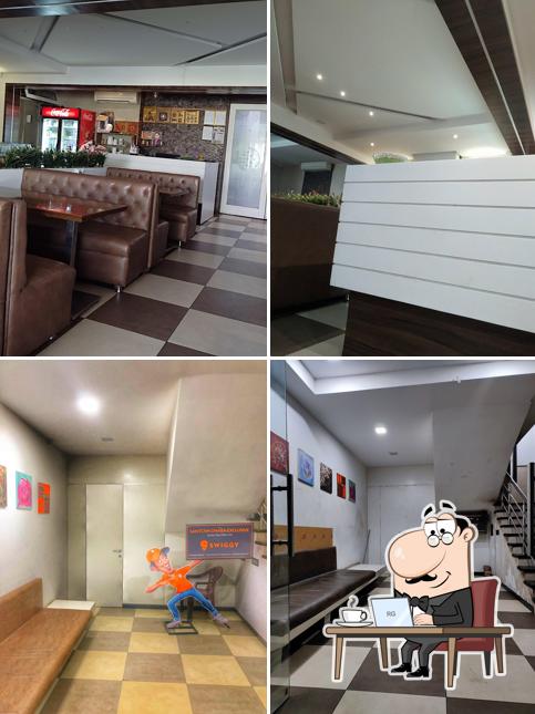 Take a seat at one of the tables at Santosh Dhaba Exclusive