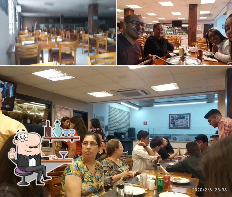 O interior do Mão Na Roda Pizzaria E Chopperia
