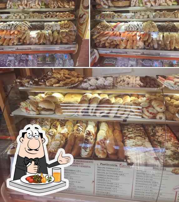 Tra le diverse cose da Voglia Di Pane Di Mannino Vincenza si possono trovare la cibo e interni