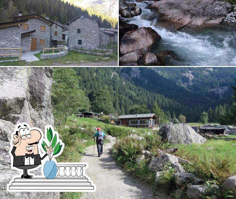 Puoi goderti l'aria fresca da seduto all'esterno di Rifugio Rasega