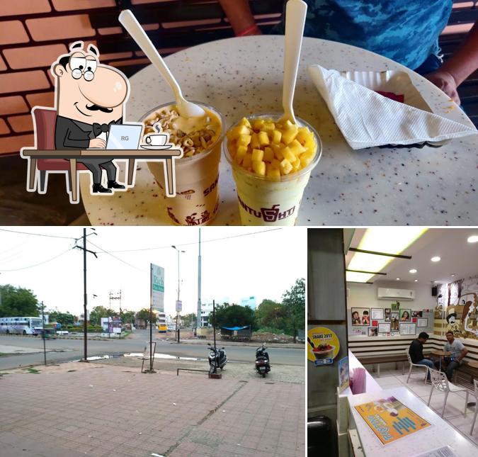 Take a seat at one of the tables at Santushti Shakes & More