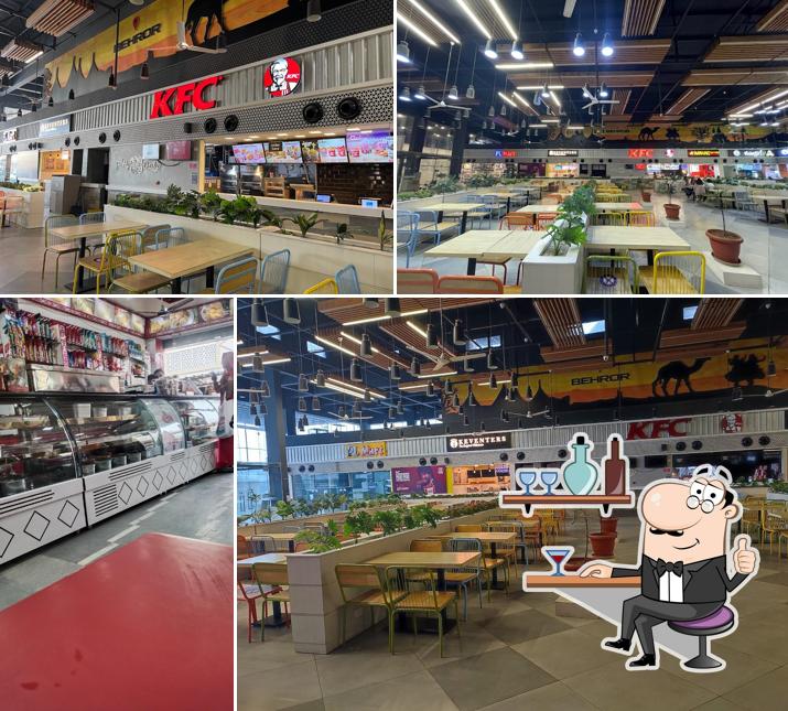 Take a seat at one of the tables at BABA TIFFIN CENTER