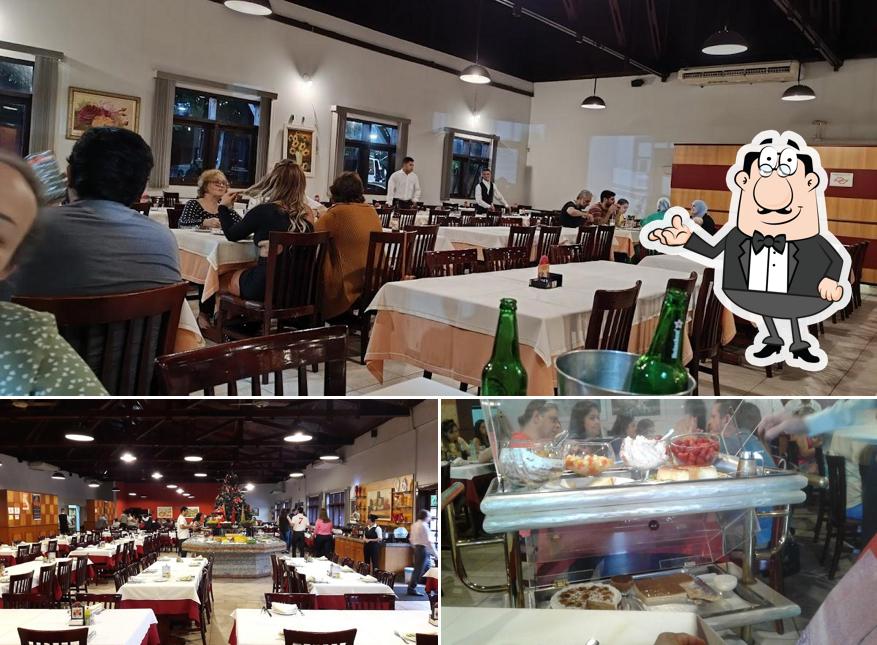 Sente em uma das mesas no Churrascaria Varandão