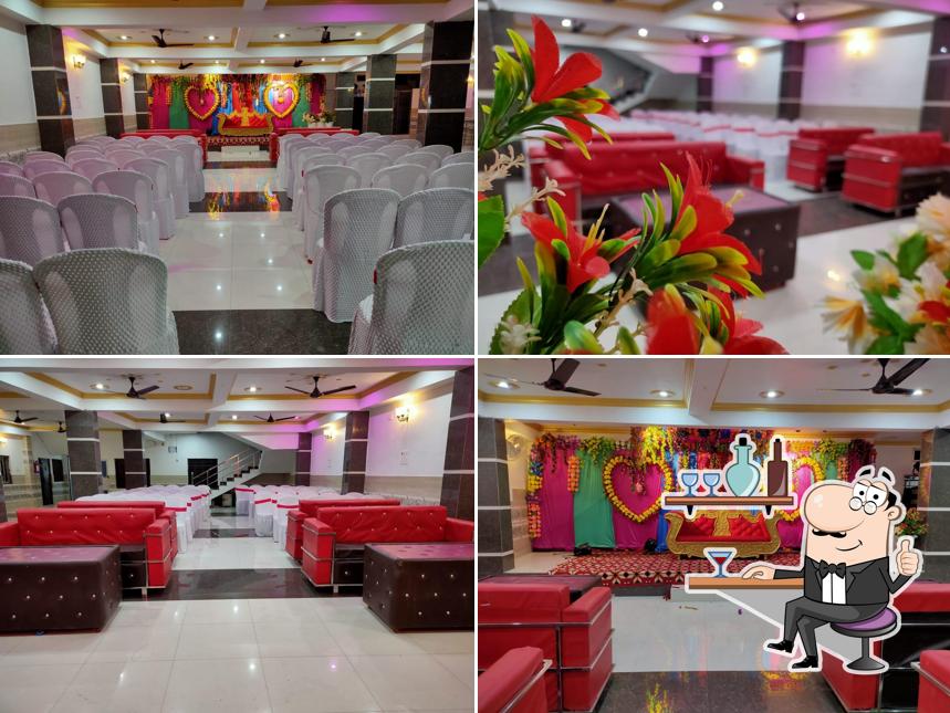 Take a seat at one of the tables at NEW BANDHAN MARRIAGE HALL,SIWAN