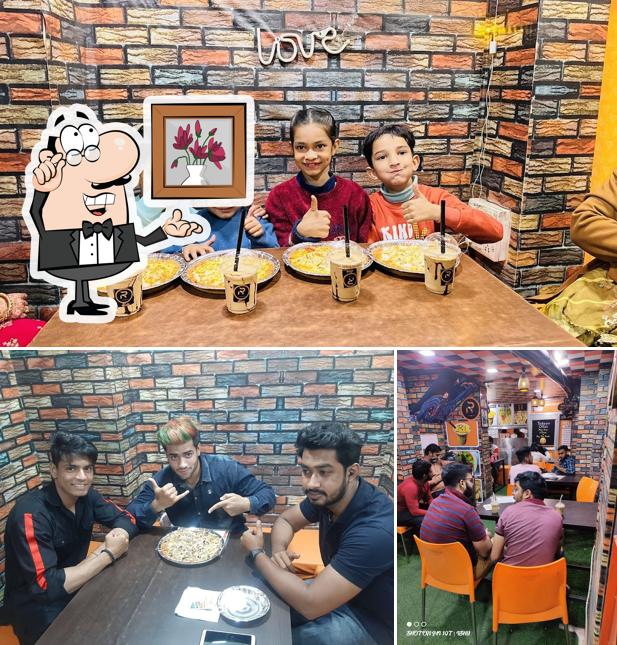 Take a seat at one of the tables at Riali