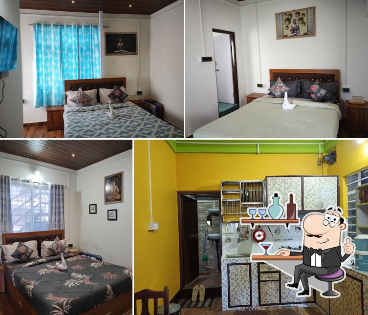 Take a seat at one of the tables at Springfield Stays Homestay and Resturant