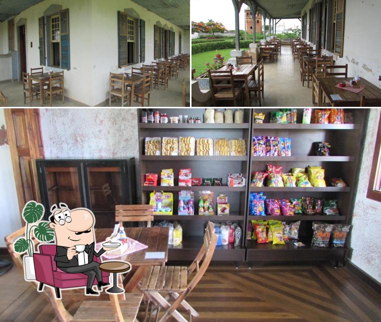 O interior do Cafeteria e Padaria Dona Maria