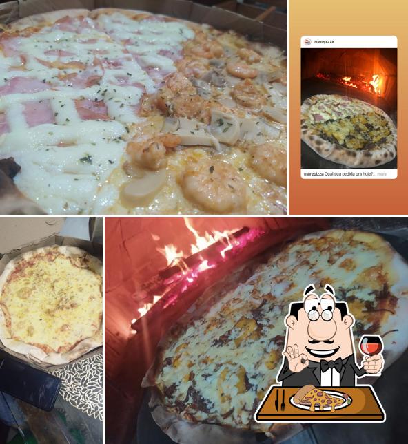 No Pizzaria Forno a lenha de ipitanga, você pode provar pizza