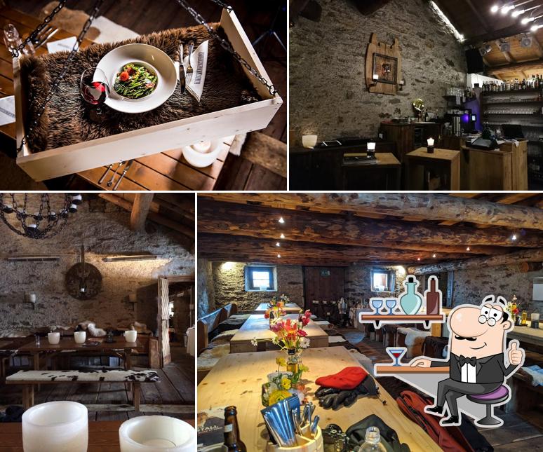 Siediti a un tavolo di Restaurant Kuhstall