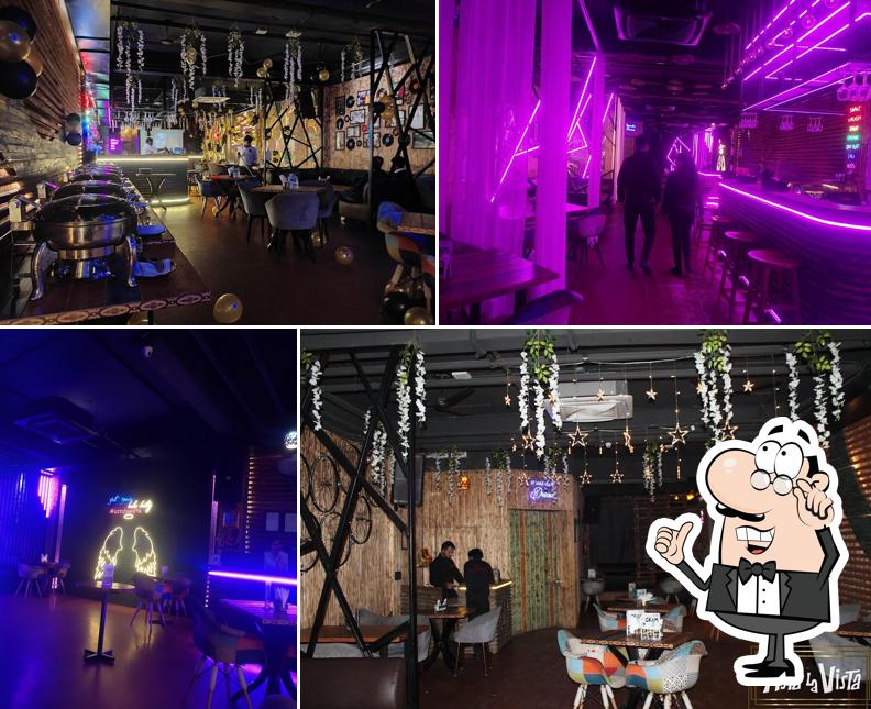 Take a seat at one of the tables at Asta La Vista Lounge and Restaurant Club in Rohtak