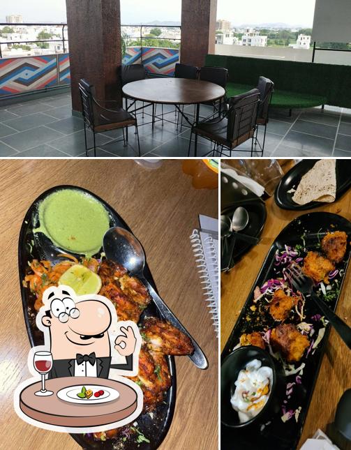 The photo of food and interior at Rustic Rooftop