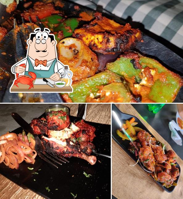 Order seafood at The Courtyard Tree, Mysuru- Premium Garden Restaurant Event Venue Catering