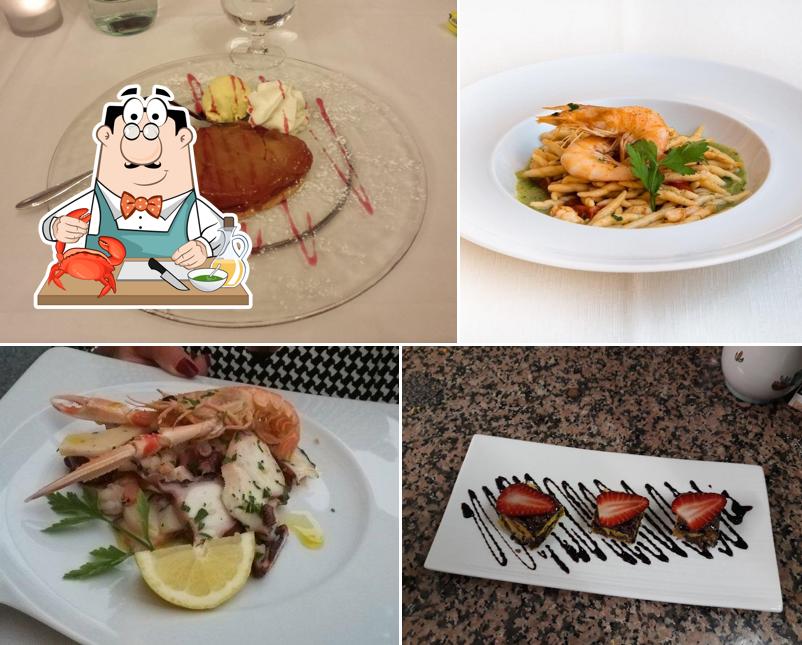 Prenditi tra i molti pasti di mare offerti a Pizzeria Ristorante Conca D'Oro