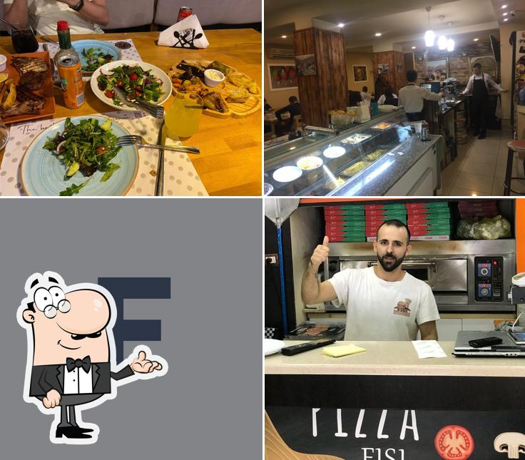 Découvrez l'intérieur de Fisi Restaurant - Traditional Food