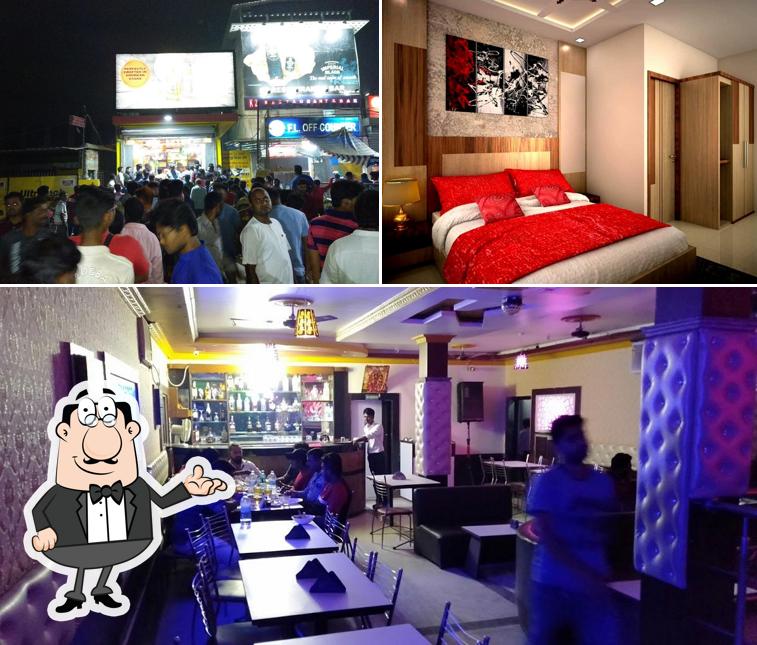 Take a seat at one of the tables at K2 Hotel and Restuarant cum Bar