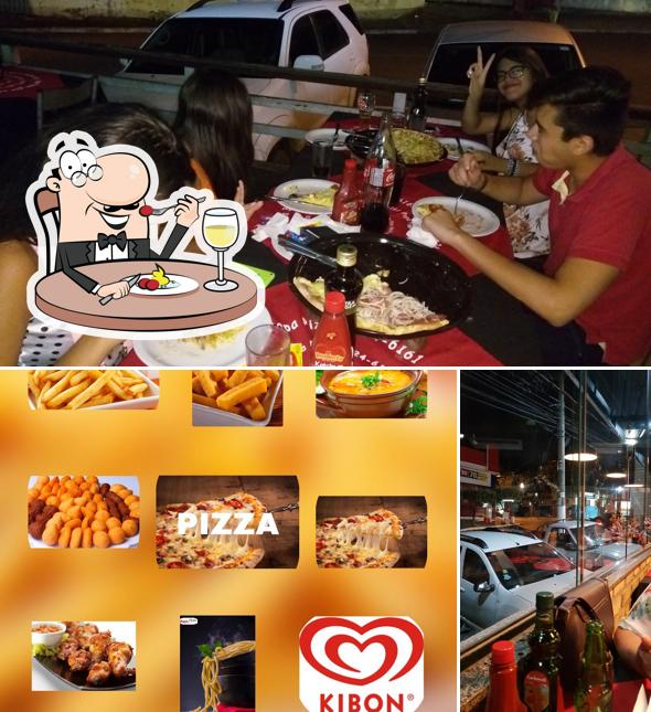 A imagem da comida e cerveja no Papa Pizza Delivery