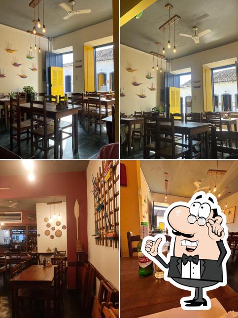 Sente em uma das mesas no Restaurante Arte e Sabor