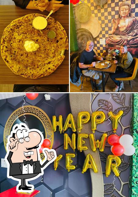 This is the picture displaying interior and food at Sitara Sweets & Parantha Junction