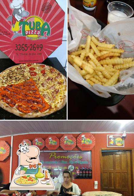 A foto da comida e interior no Tuba Pizza Sítio Cercado