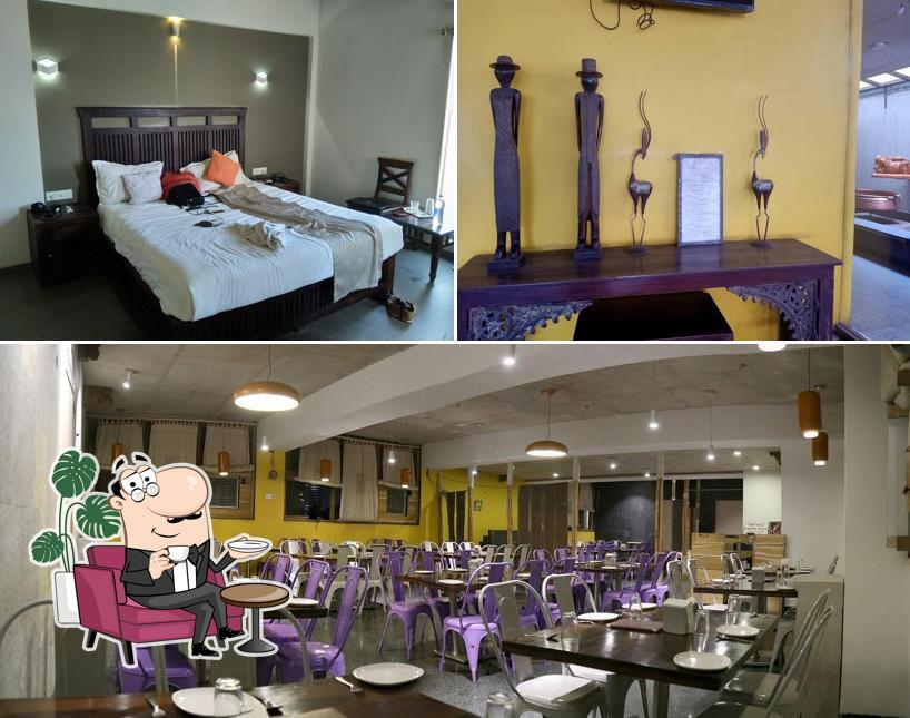 Take a seat at one of the tables at Zorba Restaurant - Pure Veg Punjabi & Chinese, Restaurant