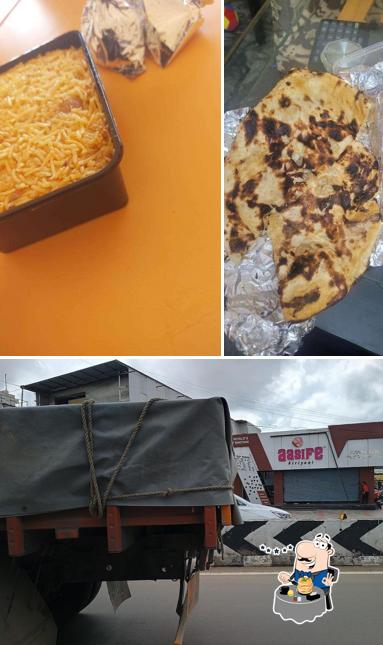 The picture of Aasife & Brothers Biriyani Centre (PEELAMEDU)’s food and exterior