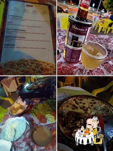 Comida em Pizzaria Modelo