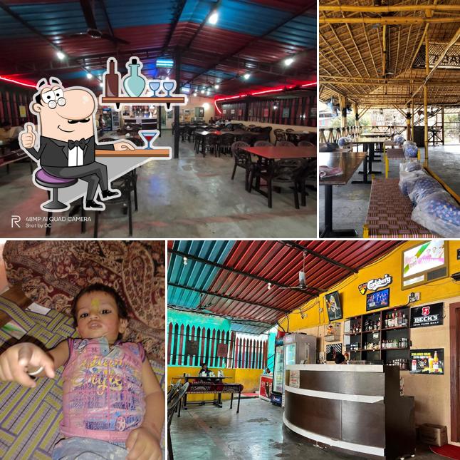 Take a seat at one of the tables at Hill View Dhaba & Bar