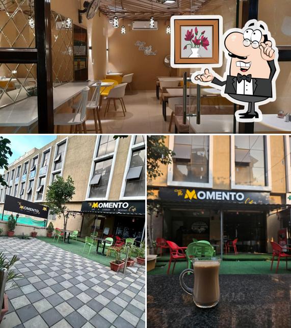 Take a seat at one of the tables at The Momento Cafe