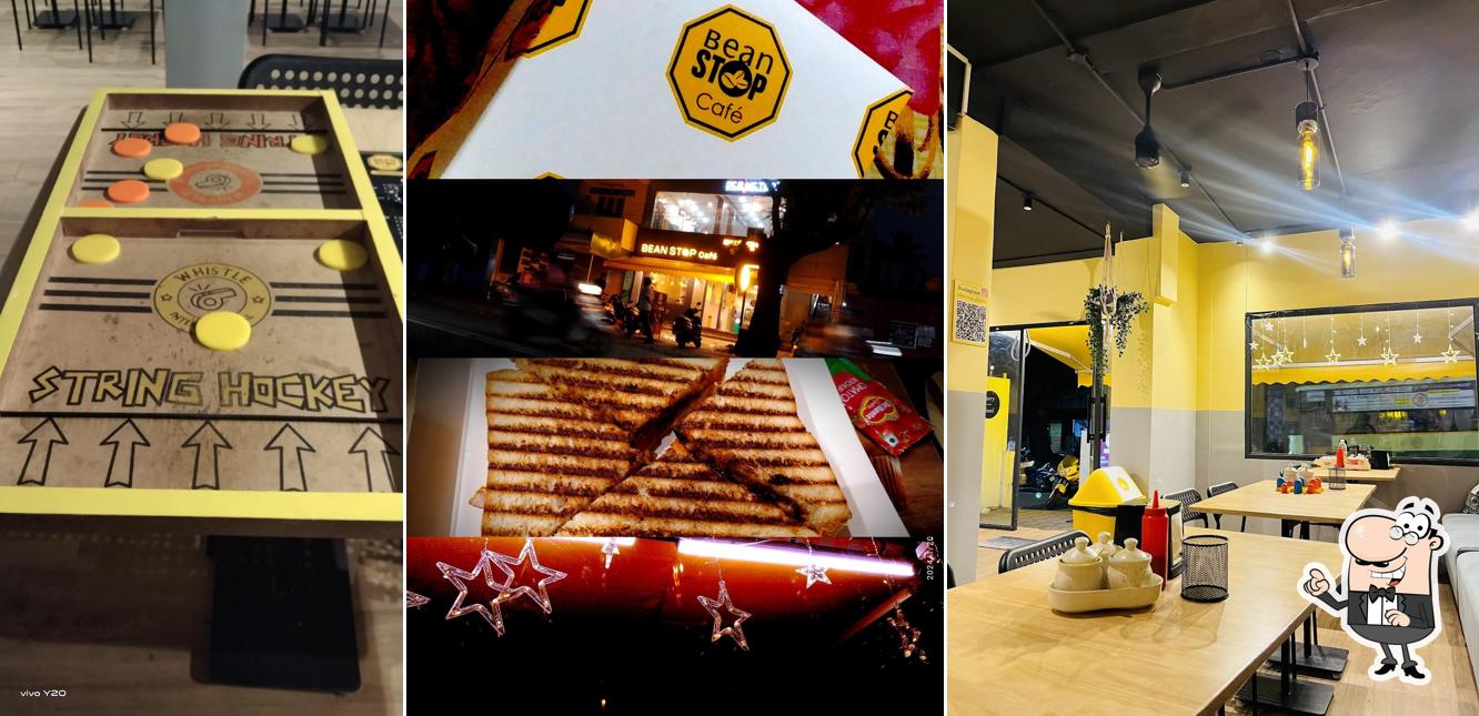 Take a seat at one of the tables at Bean Stop Cafe Agrahara