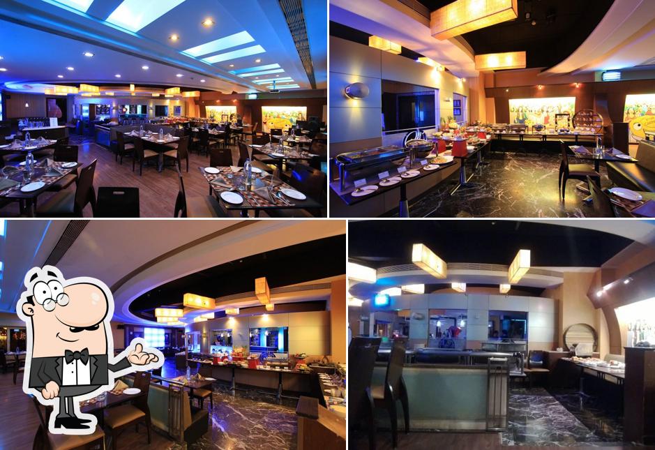 Take a seat at one of the tables at Chilli n Spice