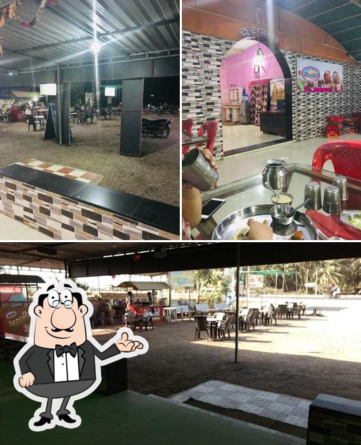 Take a seat at one of the tables at Hotel Jay Murlidhar