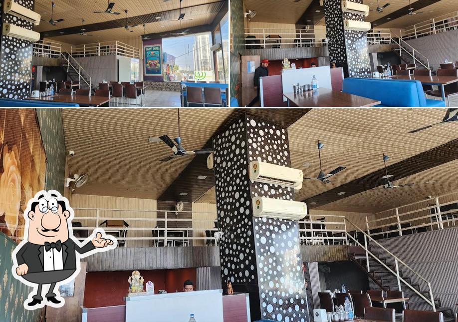 Take a seat at one of the tables at Basant Dhaba Manesar