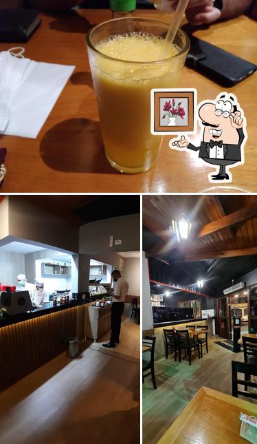 A ilustração do Konkai Sushi Rudge Ramos’s interior e bebida