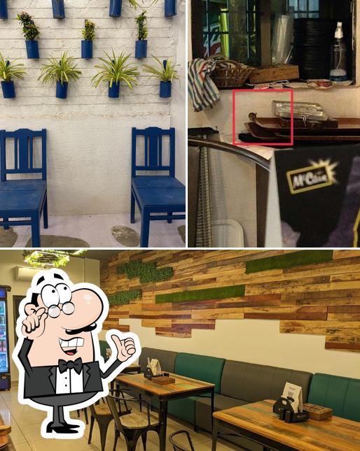 Take a seat at one of the tables at House of Size Zero