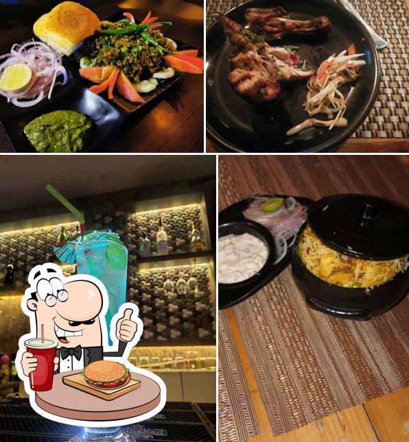 Order a burger at Reuben's Restobar