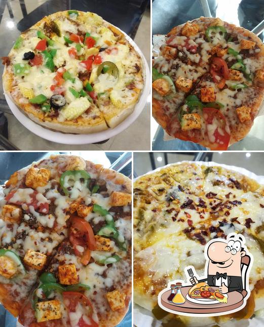 Get pizza at Cake Cafe