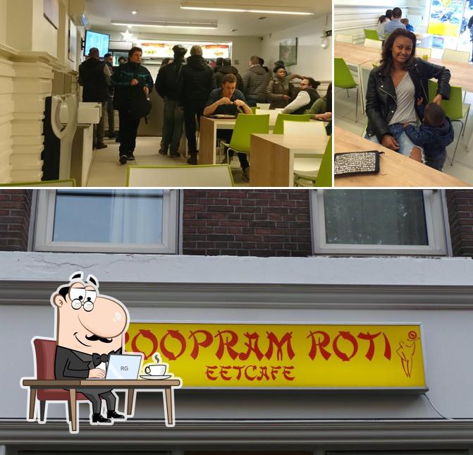 Installez-vous à l'une des tables de Roopram Roti