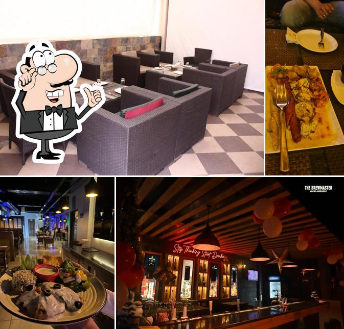 Take a seat at one of the tables at The BrewMaster - Pathankot