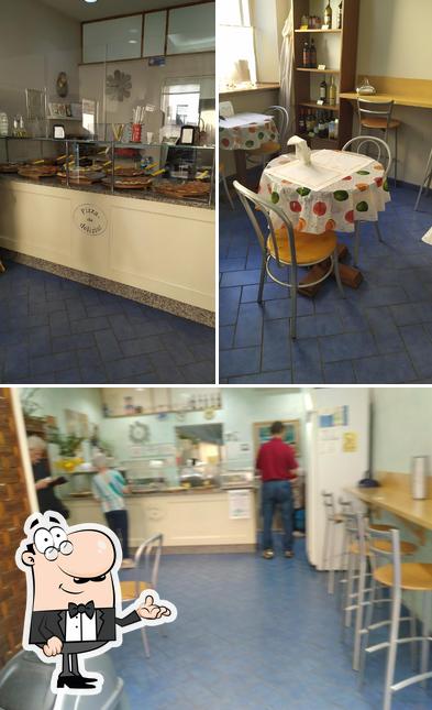 Dai un’occhiata alla immagine che presenta la interni e cibo di Pizza...che delizia!