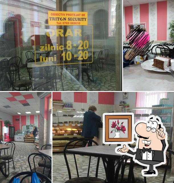 Installez-vous à l'une des tables de Cofetăria Rusalca