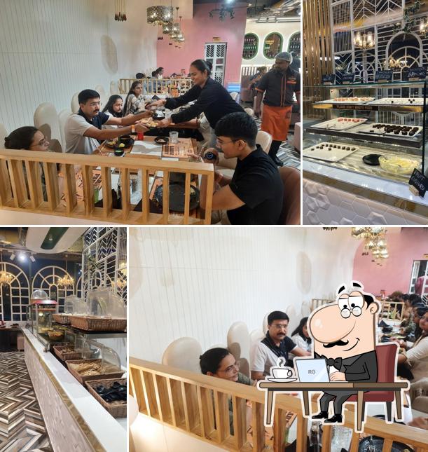 Take a seat at one of the tables at Barbecue Culture Rajkot Kalavad Road