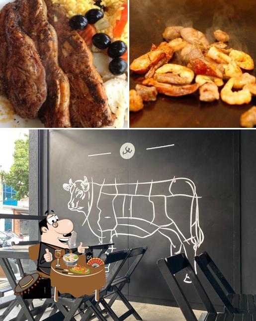 A ilustração da comida e quadro-negro no Brasa BBQ