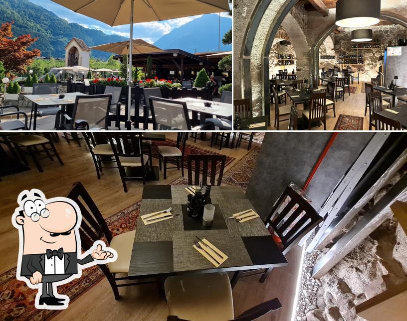 Dai un'occhiata agli interni di Roemerkeller Merano Portici