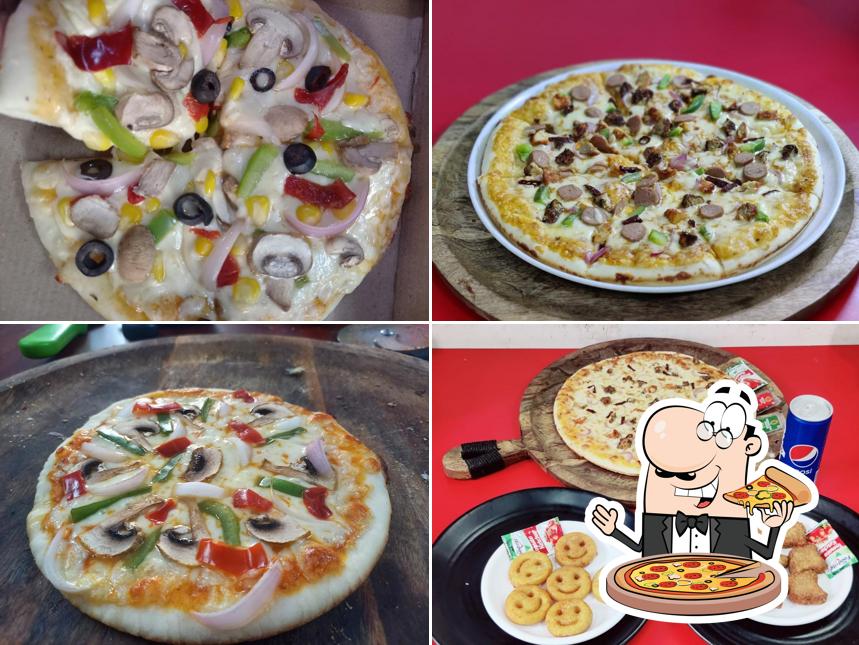 Taj Pizza - Best Pizza in Madurai Own made Base & flavours of Sauces