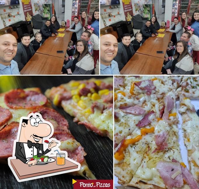 Entre diferentes coisas, comida e interior podem ser encontrados no PONTO DAS PIZZAS(CACHOEIRINHA FATIMA)