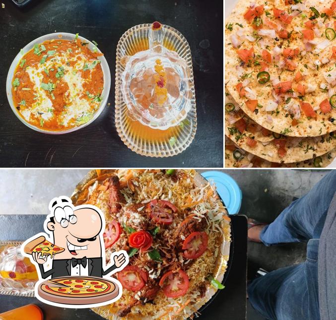 Get pizza at SVD FAMILY RESTAURANT AND DHABA A/C