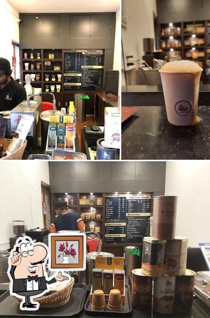 The photo of interior and beverage at Hatti Kaapi - Hassan Fresh Bean Store