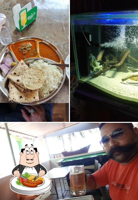 Among different things one can find food and interior at Hotel Guru Prasad Bar & Restaurant